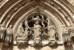 Tympanon portalu z figurami Ĺw. Cecylii i klÄczÄcego biskupa Dominika